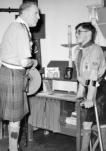 Lord Rowallan, Chief Scout, visit to Chailey in 1955. Lord Rowallan greeting the Scout troop.